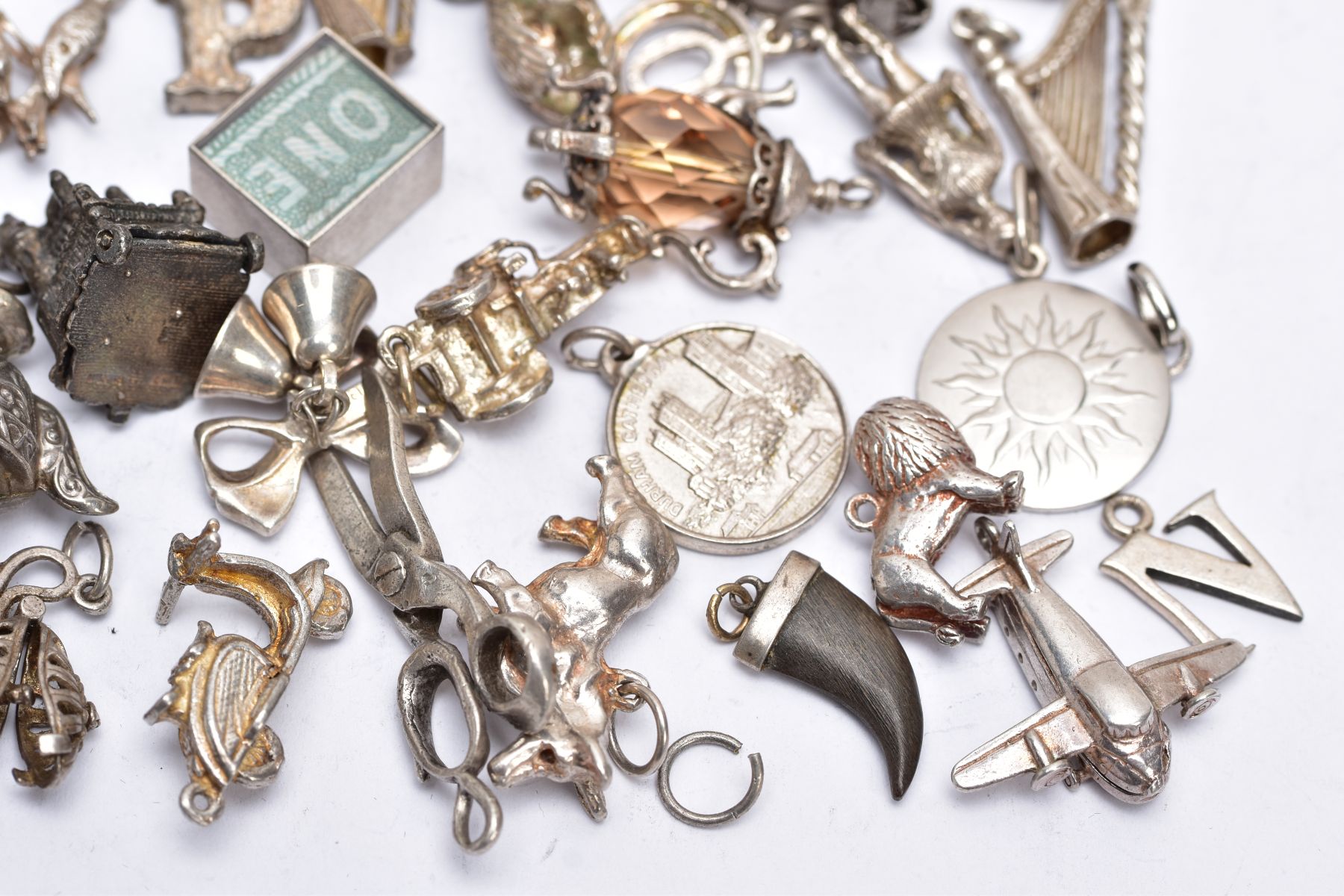 A QUANTITY OF SILVER AND WHITE METAL CHARMS, to include fifty six charms in various forms such as - Image 5 of 7