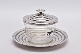 A 'CHRISTOFLE' SILVER PLATED DISH WITH LIDDED GLASS JAR, the dish of a circular form, stamped to the