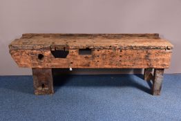 A 20TH CENTURY WORK BENCH OF PINE CONSTRUCTION, built using reclaimed timbers, approximate height
