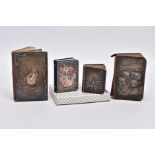 FOUR SILVER LINED RELIGIOUS BOOKS, each with a silver lined embossed designed front, with cherubs