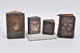 FOUR SILVER LINED RELIGIOUS BOOKS, each with a silver lined embossed designed front, with cherubs