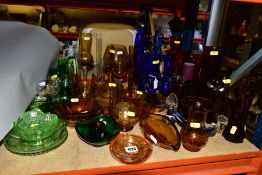 A QUANTITY OF COLOURED GLASS, to include controlled bubble bud vases, Chance handkerchief vase,