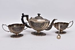 AN EARLY 20TH CENTURY THREE PIECE TEA SET, to include a teapot fitted with a wooden scroll