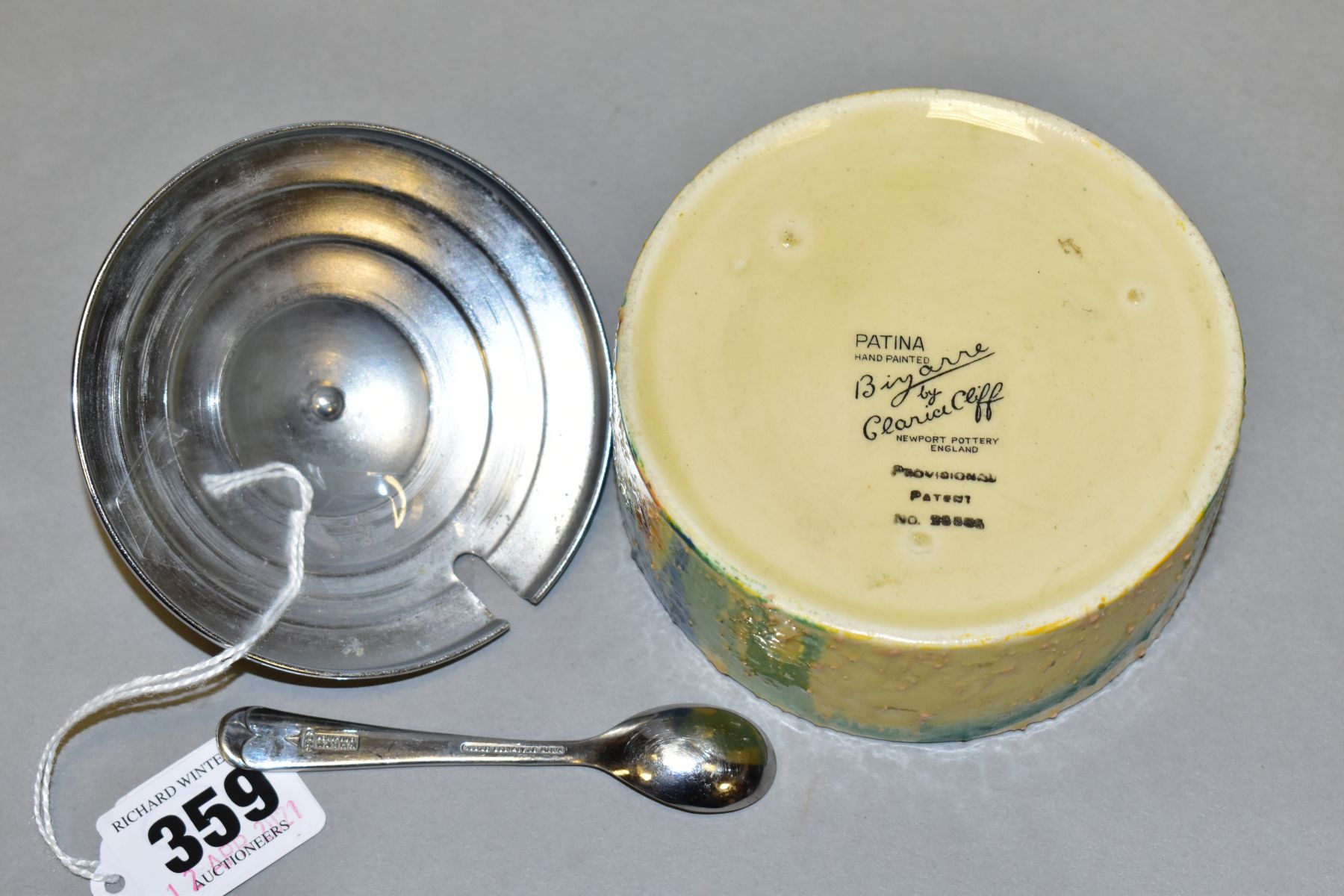 A CLARICE CLIFF BIZARRE PATINA CIRCULAR PRESERVE JAR WITH REPLACEMENT CHROME COVER AND A SPOON, - Image 5 of 5