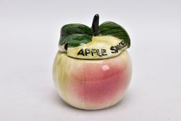 A VINTAGE TONI RAYMOND POTTERY APPLE SAUCE POT AND COVER, approximate height 12cm, good condition