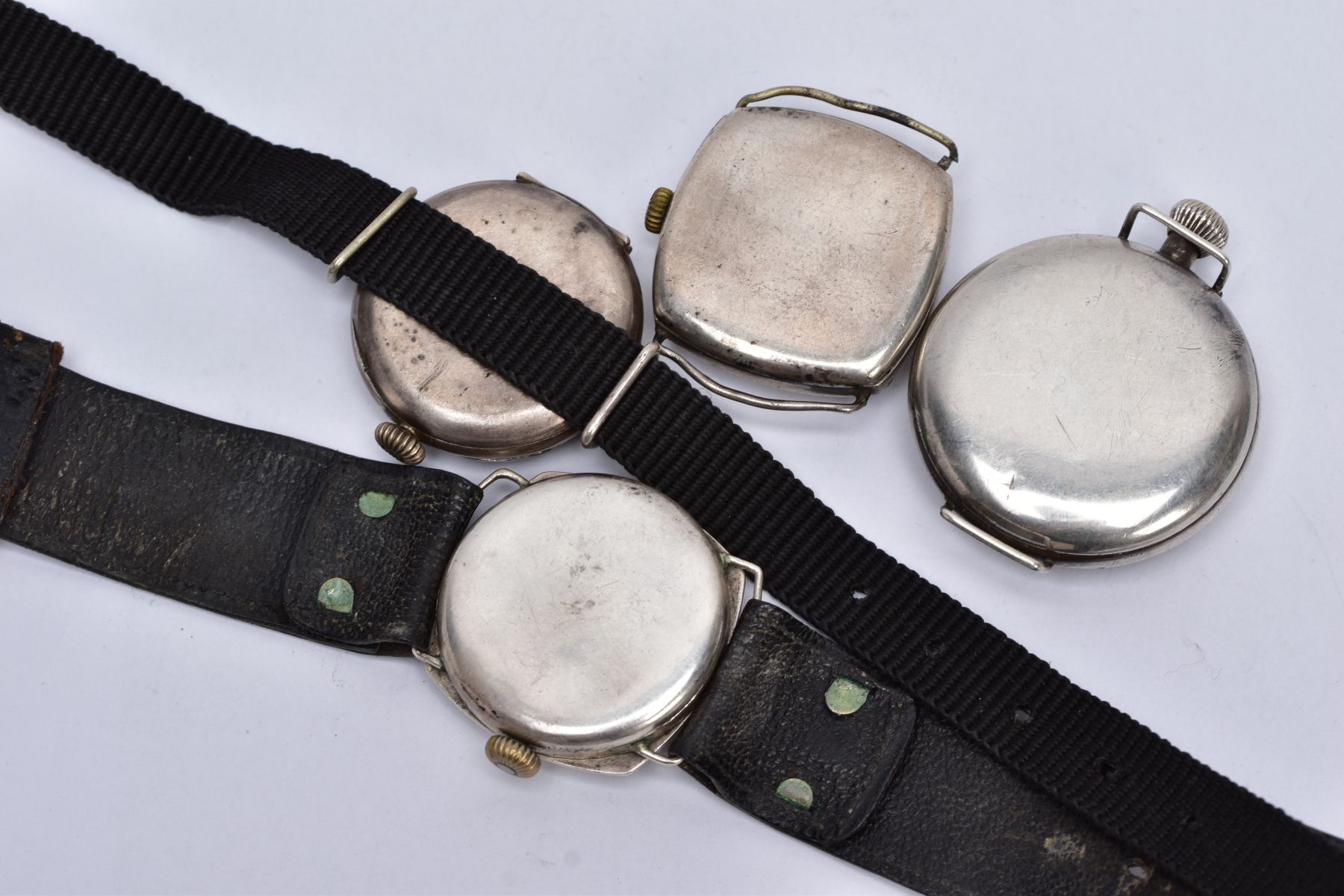 FOUR SILVER MILITARY TRENCH WRISTWATCHES, to include one with a round white dial, Arabic numerals, - Image 4 of 4