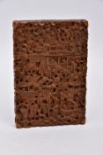 A LATE 19TH CENTURY CARVED SANDELWOOD CANTON CARD CASE, of a rectangular form, pull off cover,