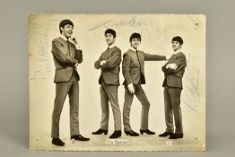 THE BEATLES, A SIGNED PHOTOGRAPH, Provenance:- In the early 1960's the vendor's mother worked in the