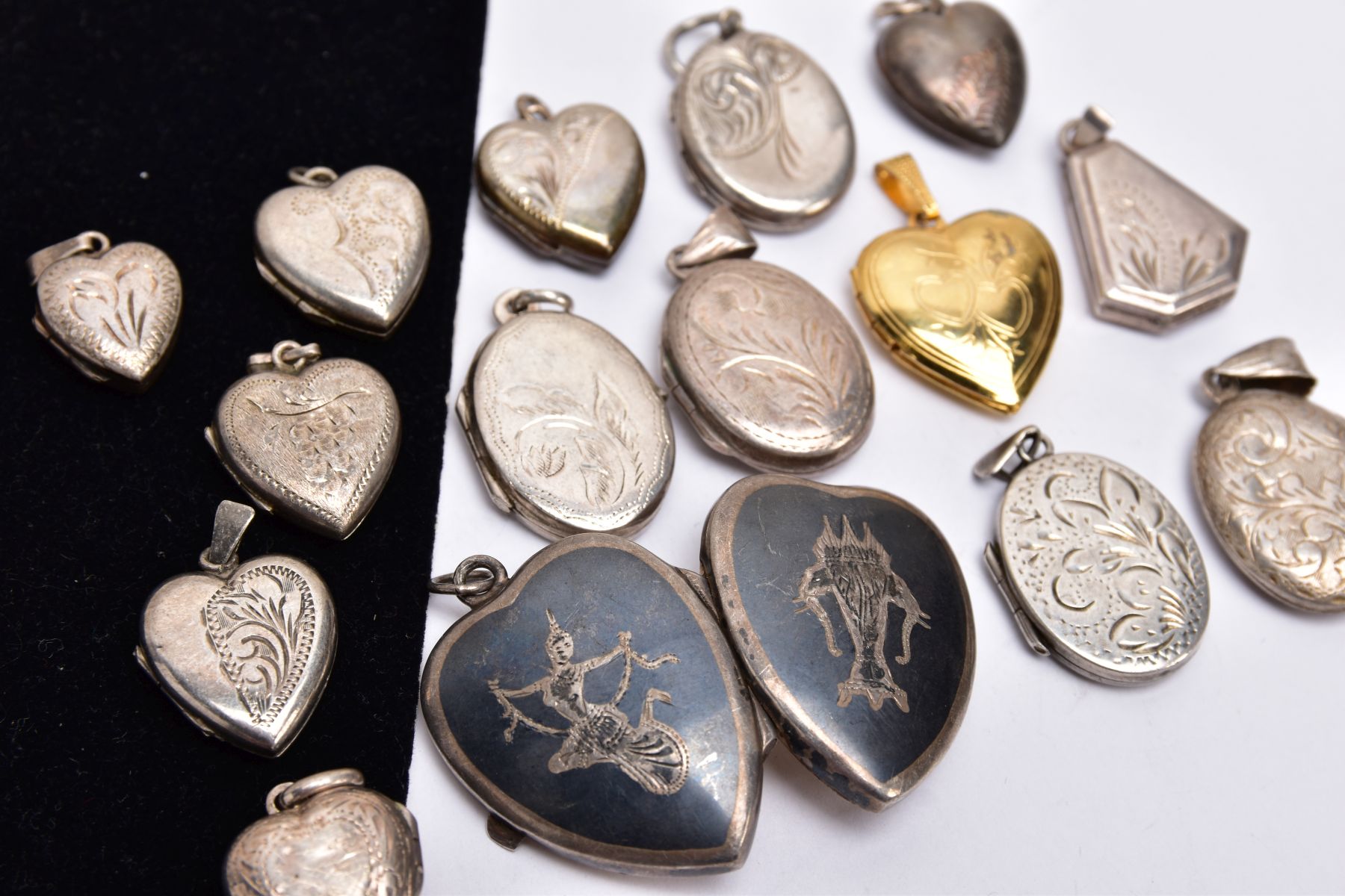 A BAG OF ASSORTED LOCKETS, with various engraved designs and shapes such as five ovals, seven - Image 2 of 3