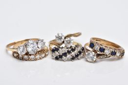 SIX 9CT GOLD GEM SET RINGS, to include a blue sapphire and colourless paste set half eternity ring