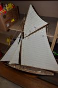 A SCRATCHBUILT WOODEN DISPLAY MODEL OF A GAFF CUTTER RIGGED SAILING BOAT, 'Britannia' constructed