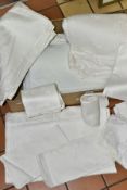 A BOX OF VINTAGE TABLE LINEN, comprising seven damask/cotton table cloths and eleven napkins, one