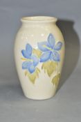 A SMALL MOORCROFT STYLE POTTERY VASE, 'Campanula' on cream ground, no marks to base, height 10.