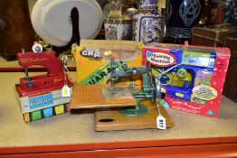 THREE CHILDS SEWING MACHINES, boxed Vulcan Minor, complete with instruction book and clamp, box
