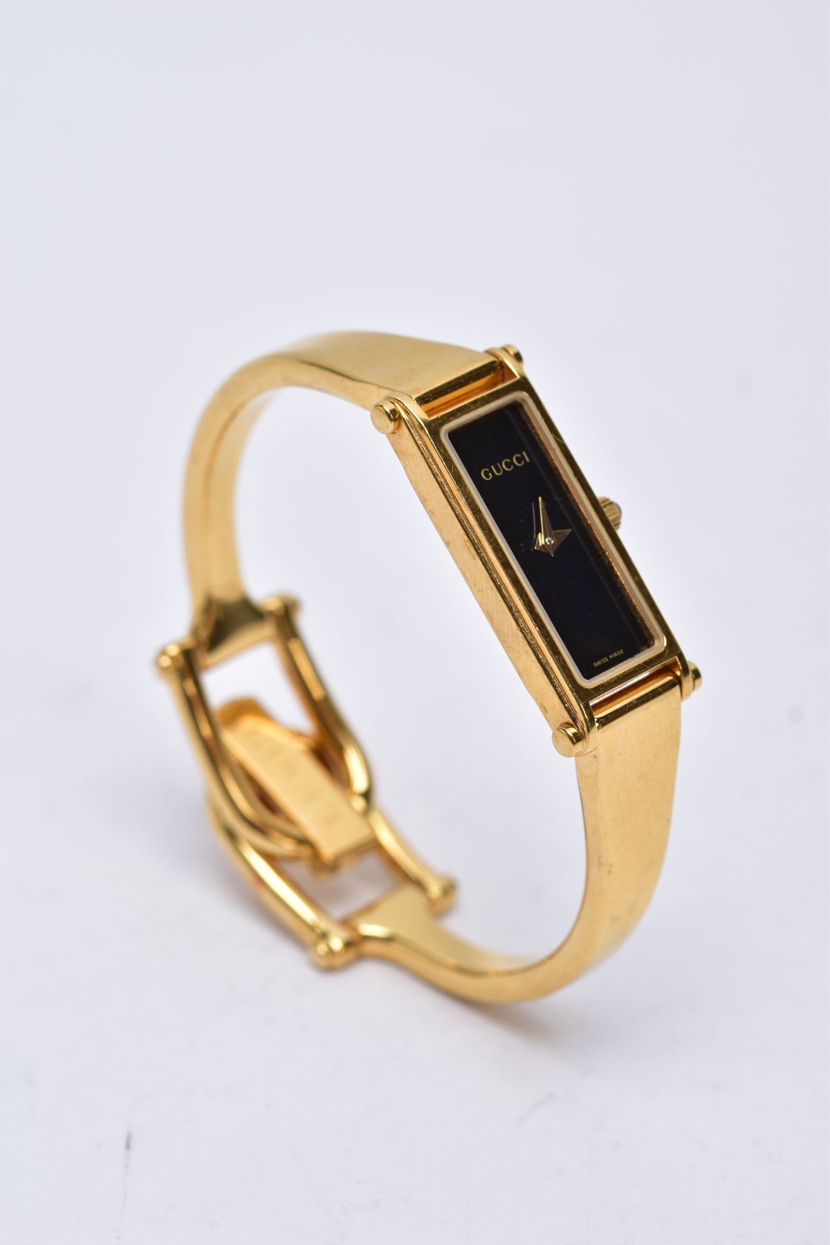 A LADIES GUCCI 1500L WRISTWATCH, the yellow metal wristwatch designed with a black rectangular - Image 3 of 6