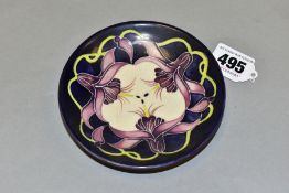 A MOORCFROFT POTTERY TRINKET/PIN DISH, decorated with purple Fuchsia, imprinted backstamp and