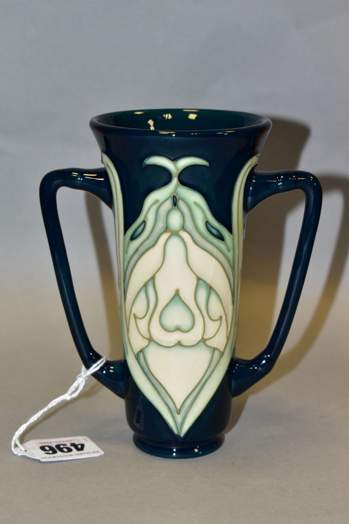 A MOORCROFT POTTERY COLLECTORS CLUB TWIN HANDLED VASE, 'Snowdrop' pattern designed by Rachel Bishop,