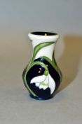 A MOORCROFT POTTERY MINIATURE VASE, 'SOULFUL CHEER' designed by Nicola Slaney, depicting snowdrops