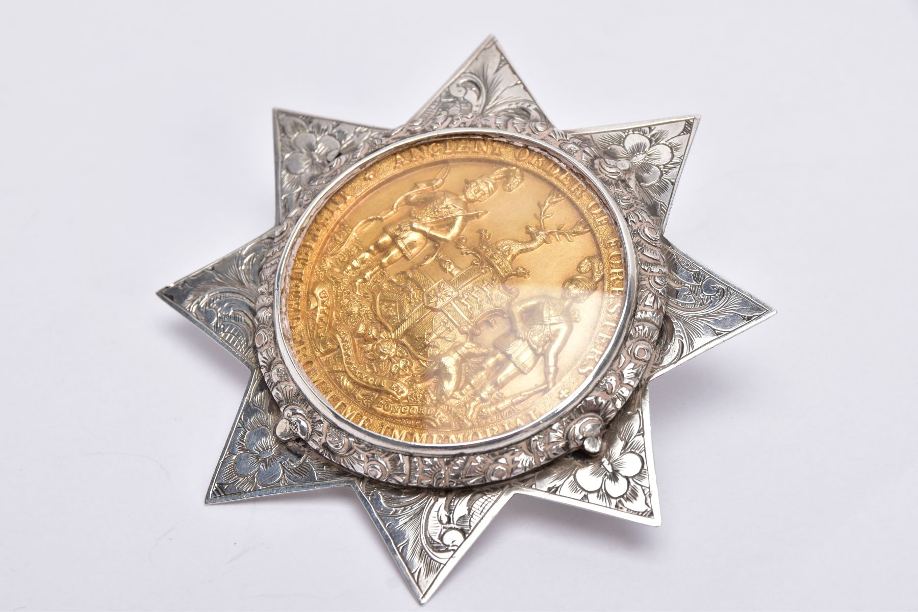 A MID VICTORIAN SILVER CHIEF RANGERS MASONIC MEDAL, star form with an engraved floral design, set - Image 3 of 6