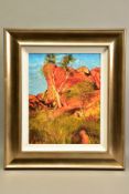 ROLF HARRIS (AUSTRALIAN 1930) 'SUN ON DEVIL'S MARBLES', a limited edition print of an Australian