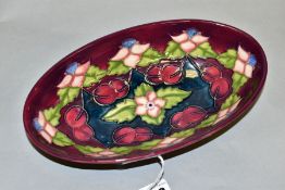 A MOORCROFT COLLECTORS CLUB OVAL MORELLO PATTERN BOWL, circa 1995, no 433, oval 23cm x 13cm (