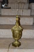 A LATE 19TH CENTURY ORMOLU TABLE LAMP OF URN FORM, with seated Putti holding a garland and flowers