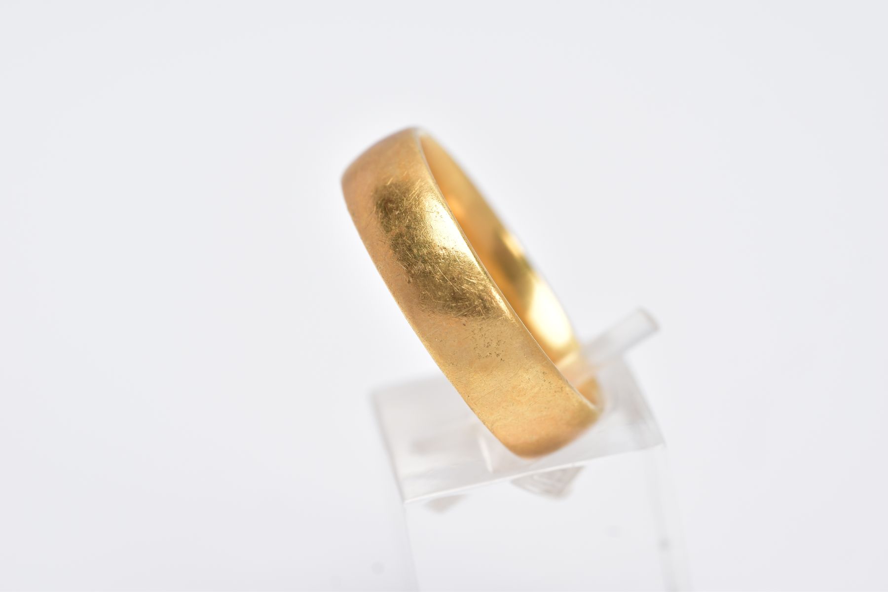 AN 18CT GOLD WIDE BAND, of a plain polished design, approximate width 6mm, hallmarked 18ct gold - Image 2 of 3