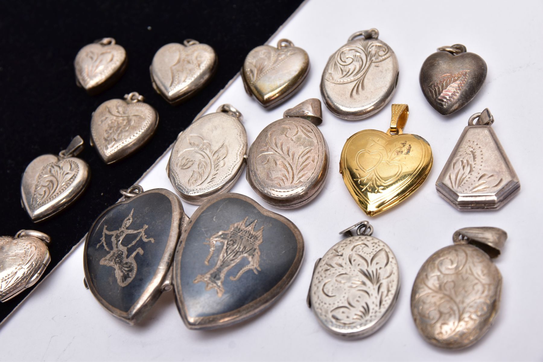 A BAG OF ASSORTED LOCKETS, with various engraved designs and shapes such as five ovals, seven - Image 3 of 3