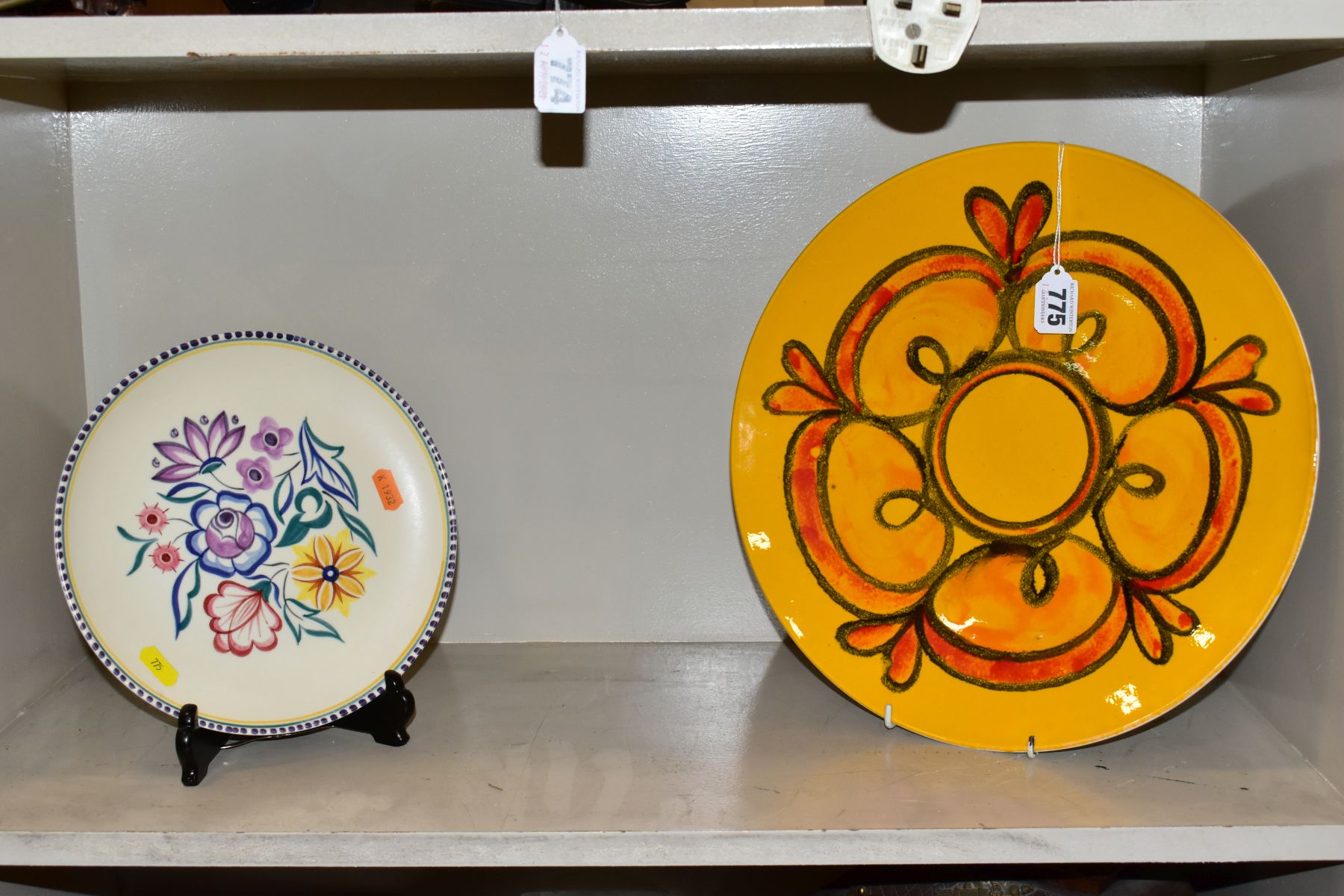 A POOLE POTTERY DELPHIS CIRCULAR CHARGER, diameter 35cm, together with a Poole hand painted plate