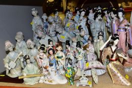 A COLLECTION OF LATE 20TH CENTURY PORCELAIN AND RESIN FIGURES OF GEISHA GIRLS, in a variety of