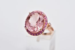 A LARGE 18CT ROSE GOLD MORGANITE DIAMOND AND PINK SAPPHIRE DRESS RING, centering on an oval mixed