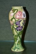 A MOORCROFT COLLECTORS CLUB BALUSTER VASE, decorated in a Sweet pea design, circa 1991, printed,