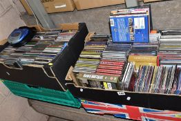 FOUR BOXES OF CD'S AND A SMALL QUANTITY OF DVD'S, CD's include musicals, classical, rock n'roll,