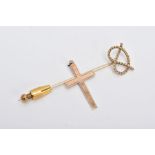 A 9CT GOLD STICK PIN AND A YELLOW METAL PENDANT, the stick pin in the form of a rope twist knot,