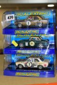 TWO BOXED SCALEXTRIC FORD ESCORT MK1 RALLY CARS, RS1600 No.1 in gold, (C2920) and 1972 East