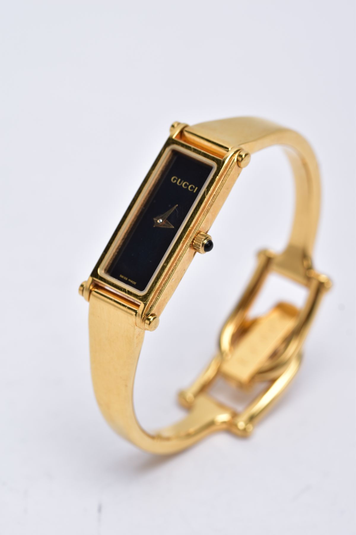 A LADIES GUCCI 1500L WRISTWATCH, the yellow metal wristwatch designed with a black rectangular - Image 2 of 6