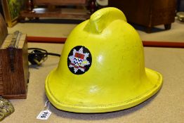 A LONDON FIRE BRIGADE FIREMANS HELMET, canty style No F135 by Helmets Ltd, size small 51-56cm and