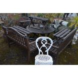 THREE MATCHING STAINED TEAK GARDEN BENCHES, length 113cm along with a circular folding garden