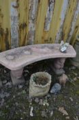 A PINK PAINTED COMPOSITE CURVED GARDEN BENCH 116cm x height 40cm along with a small planter and