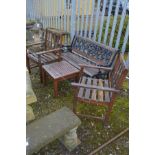 A BLACK PAINTED CAST IRON AND SLATTED GARDEN BENCH, with a floral back, width 126cm, along with a