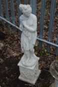 A LATE 20TH CENTURY COMPOSITE GARDEN STATUE of a semi clad classical figure of a lady in flowing