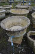 A SET OF THREE COMPOSITE CIRCULAR PLANTERS, on a separate base, marked Sandford Stone, diameter 40cm