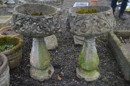 A PAIR OF COMPOSITE GARDEN PLANTERS, with foliate decoration, on a high separate bases, diameter