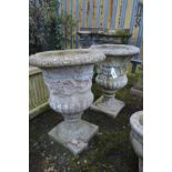 A PAIR OF COMPOSITE CAMPANA URNS, on a separate square base, diameter 44cm x height 63cm (Sd to base