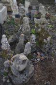 A PAIR OF GARDEN GNOME PLANTERS, along with four other gnome figures, two other figures and a