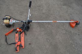 A STIHL FS 96 PETROL STRIMMER, with carrying back strap (pulls freely and starts)