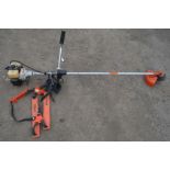 A STIHL FS 96 PETROL STRIMMER, with carrying back strap (pulls freely and starts)