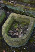 A SANDSTONE WATER TROUGH, width 49cm x depth 57cm x height 23cm