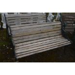 A PAIR OF METAL TEAK SLATTED BENCHES, width 127cm (rickety)