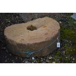 A SANDSTONE MILL WHEEL, diameter 77cm x height 26cm